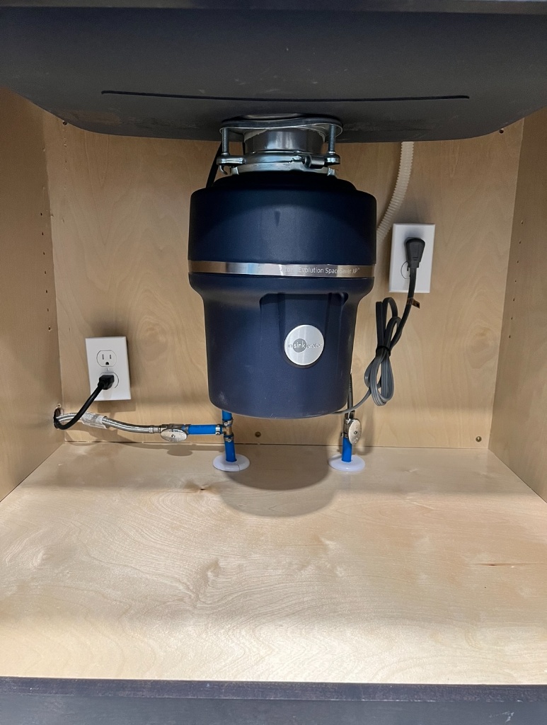 InSinkErator garbage disposal installation