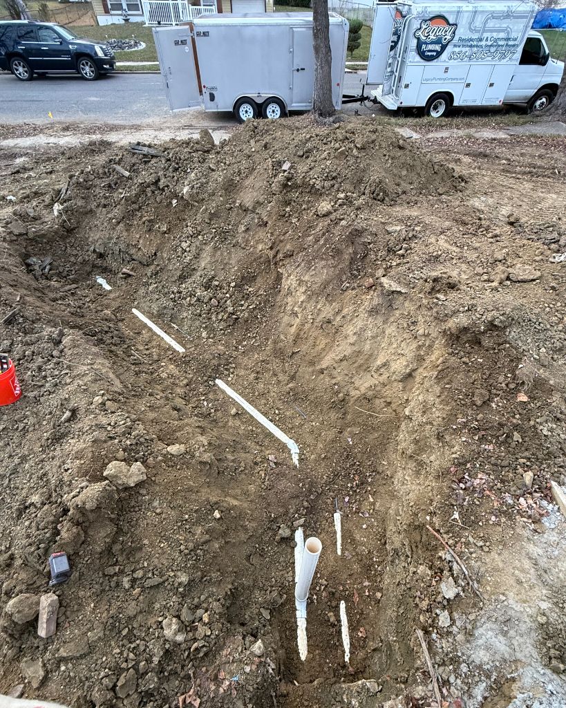 Legacy Plumbing truck on site with below-slab PVC rough-in
